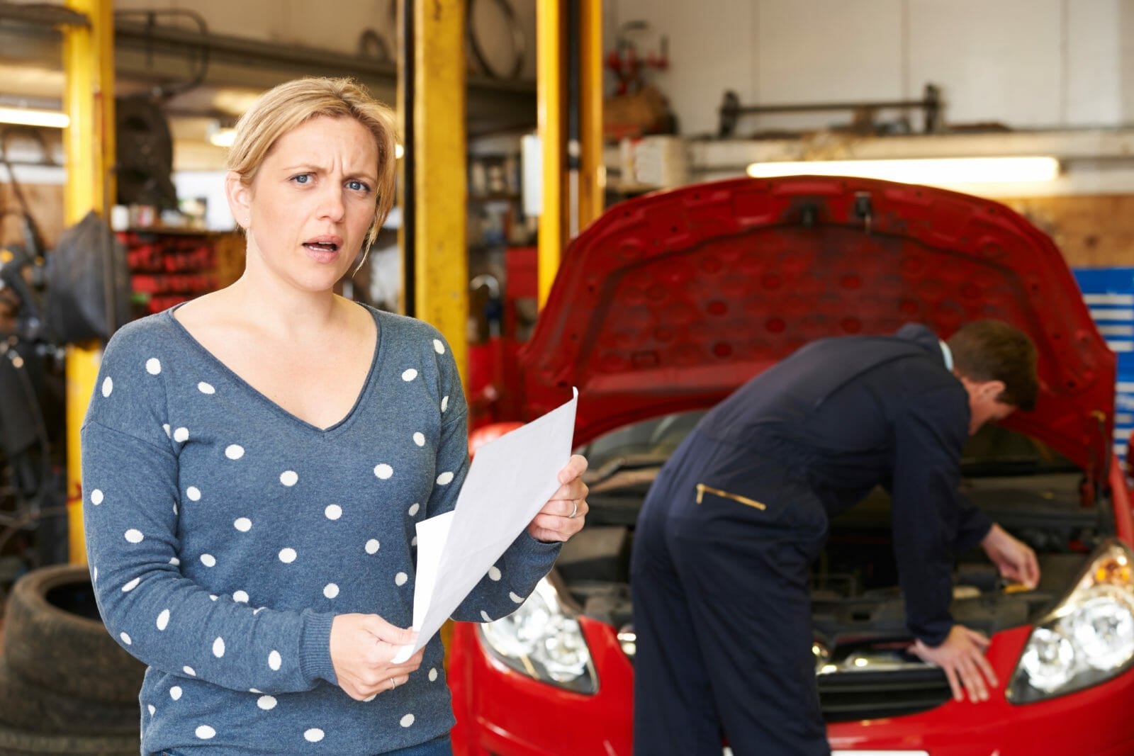 Shocked Customer Looking At Garage Bill